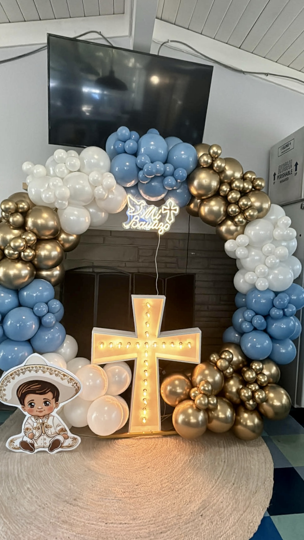 Blue gold baptism balloon arch